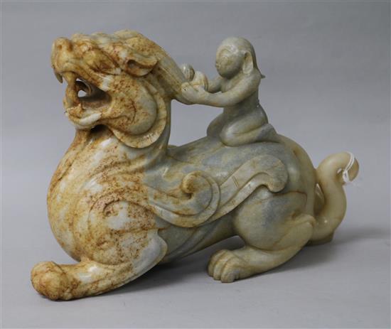A large Chinese white and grey jade group of a lion-dog width 29cm height 14cm